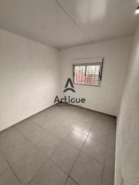 Dormitorio y ventana